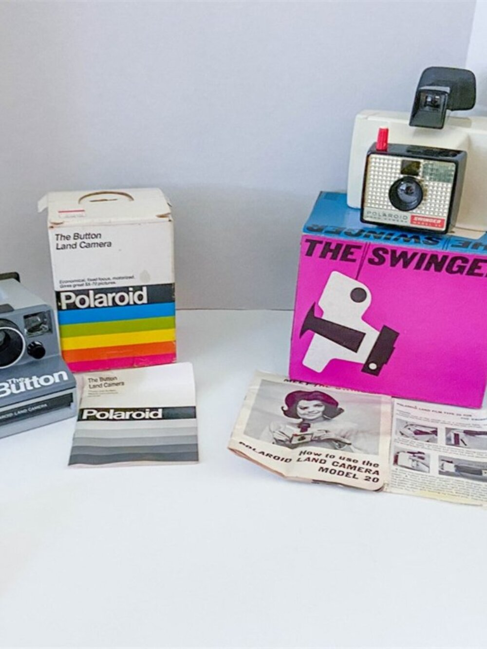 2 Vintage 60's & 80's Polaroid Instant Land Cameras Swinger Model 20, The Button